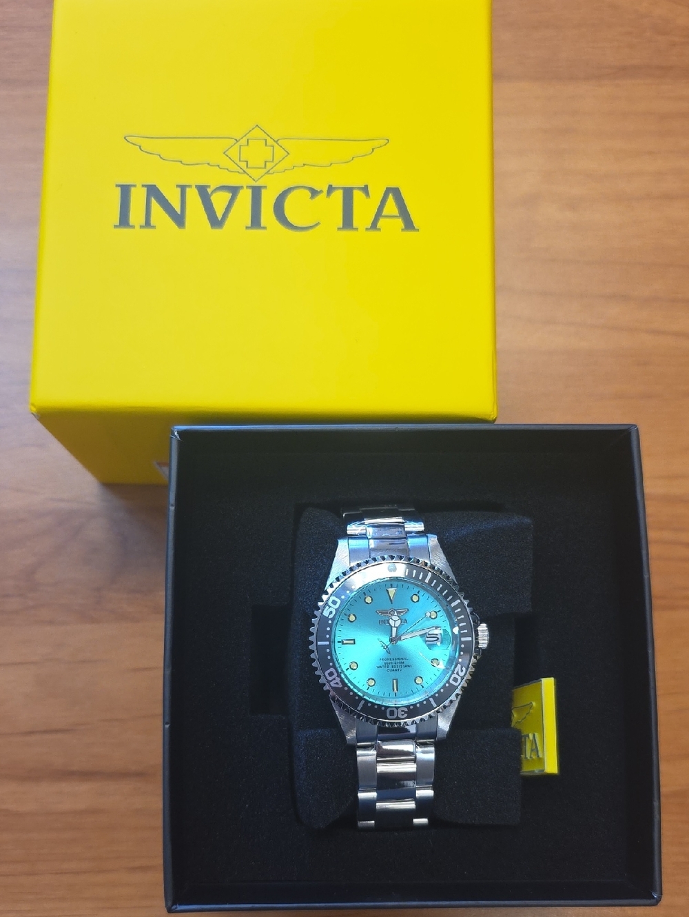 Invicta Pro Diver Men's Silver Watch with Turquoise Blue Dial